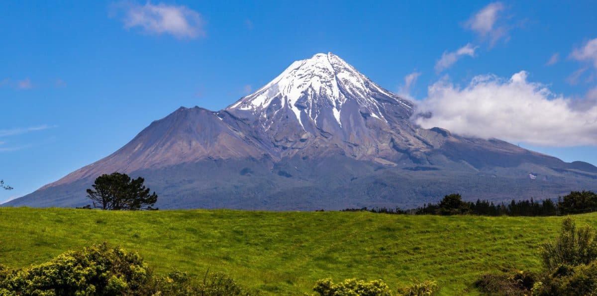 A view a Taranaki on the southern side of the volcano. Taranaki is a volcano on the south western part of the North Island of New Zealand. One a clear day it can be seen all the way from Tongariro. The Most Family-Friendly Countries You Should Visit With Your Kids