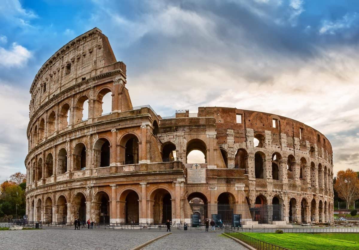 Colosseum (Coliseum) is one of main travel attraction of Rome in Italy. Ancient Roman ruins, landscape of old Rome city.