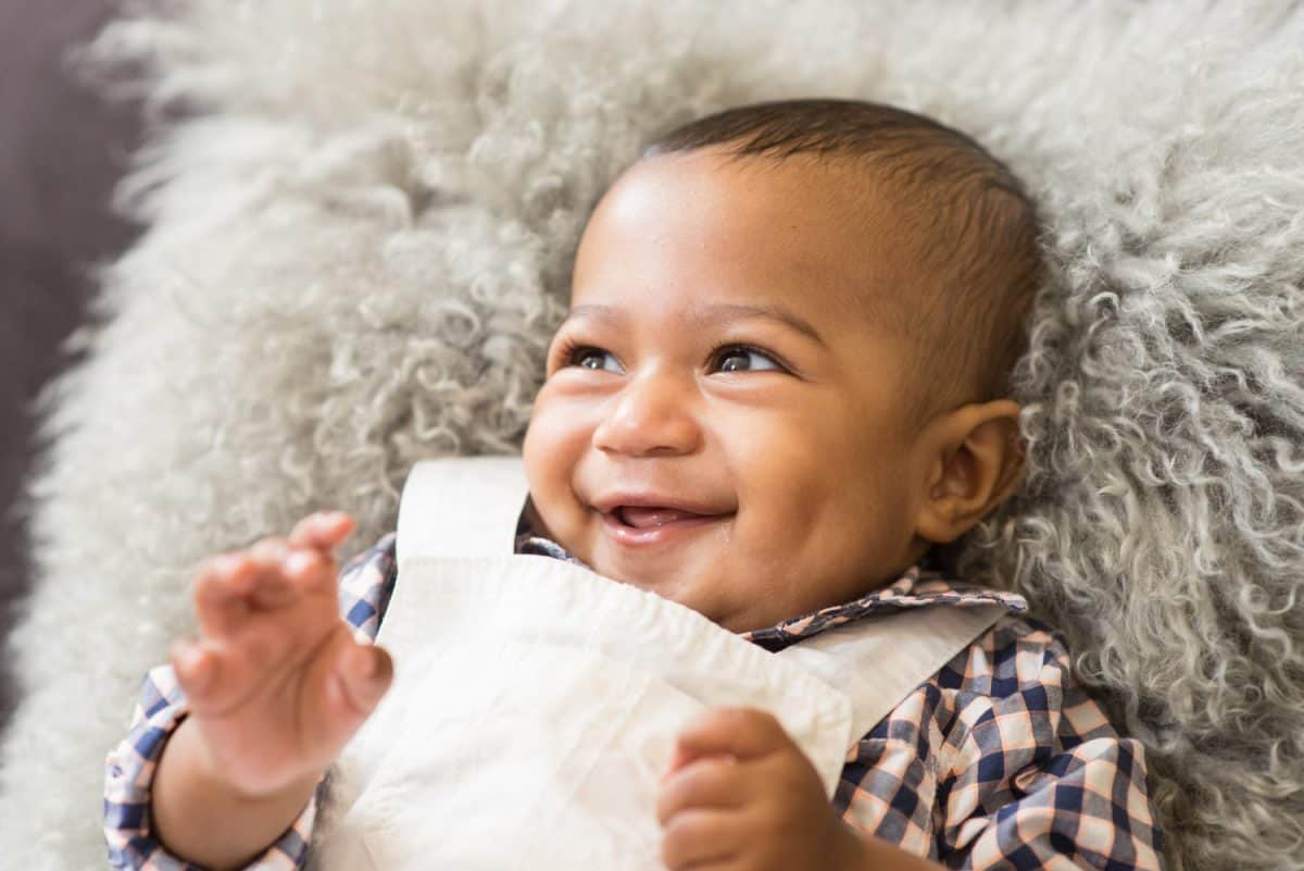 Smiling happy baby at home