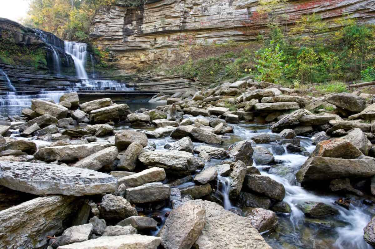 Located in Cookeville, Tennessee, the 75-foot tall Cummins Falls is one of the most beautiful waterfalls in the state! It's gorge and rocky terraces layer the landscape with stunning scenery.