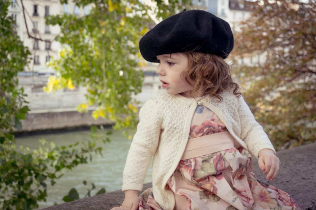 Sweet little baby girl (one year) with beret in Paris