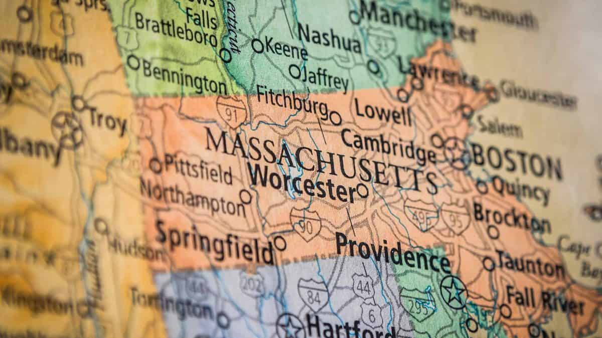 Closeup Selective Focus Of Massachusetts State On A Geographical And Political State Map Of The USA.