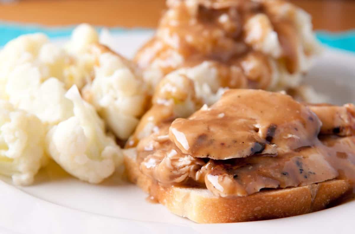 open faced hot chicken sandwich with mased potatoes