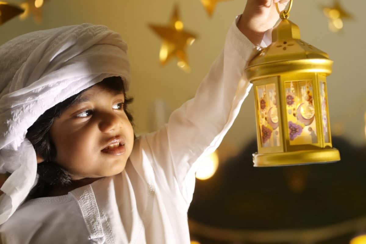 Arab boy celebrating Ramadan, Eid Mubarak