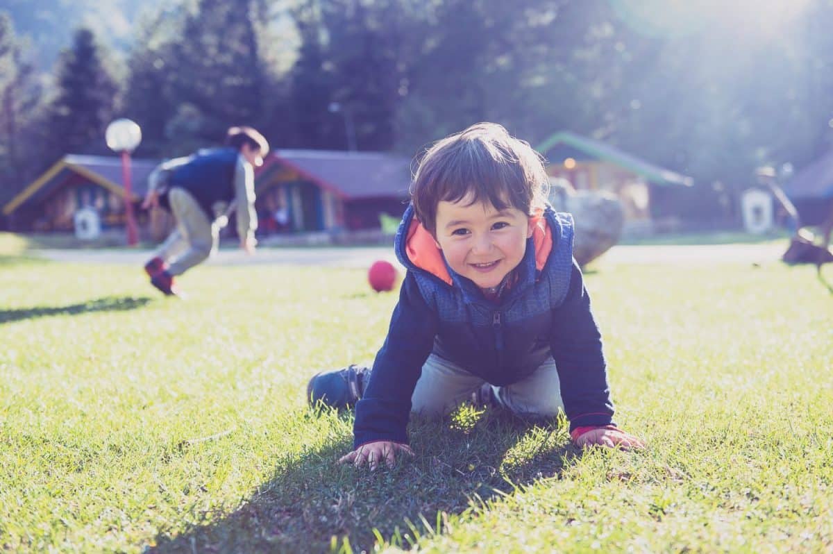 Cute kid playing outdoors