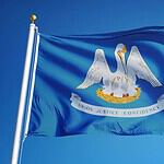 A Blue Flag with a Pelican Wounding Herself