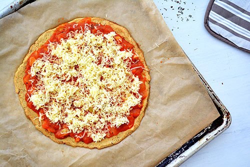 cauliflower crust pizza as it goes in to the oven