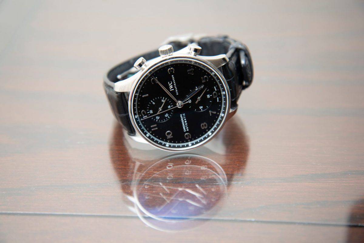 Chronograph IWC watch. Black face with silver framing.