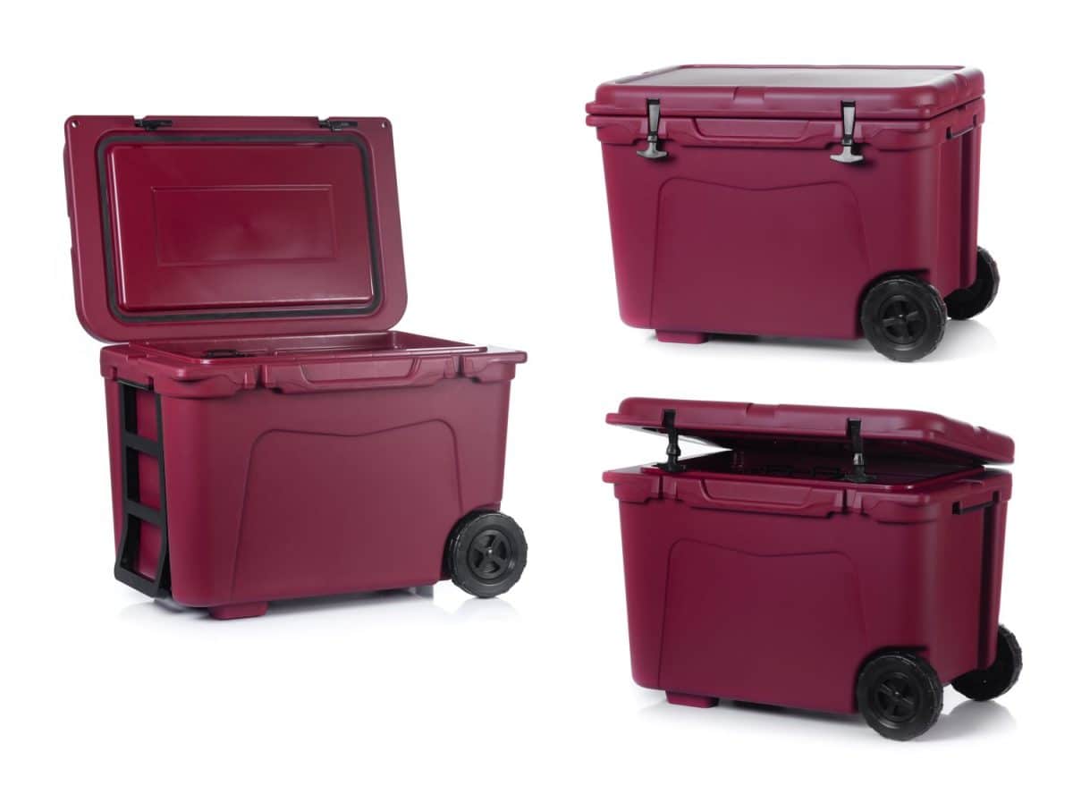 Red cooling box with wheels isolated on white background. 8 Coolers That Are Cheaper and Just as Good as a Yeti