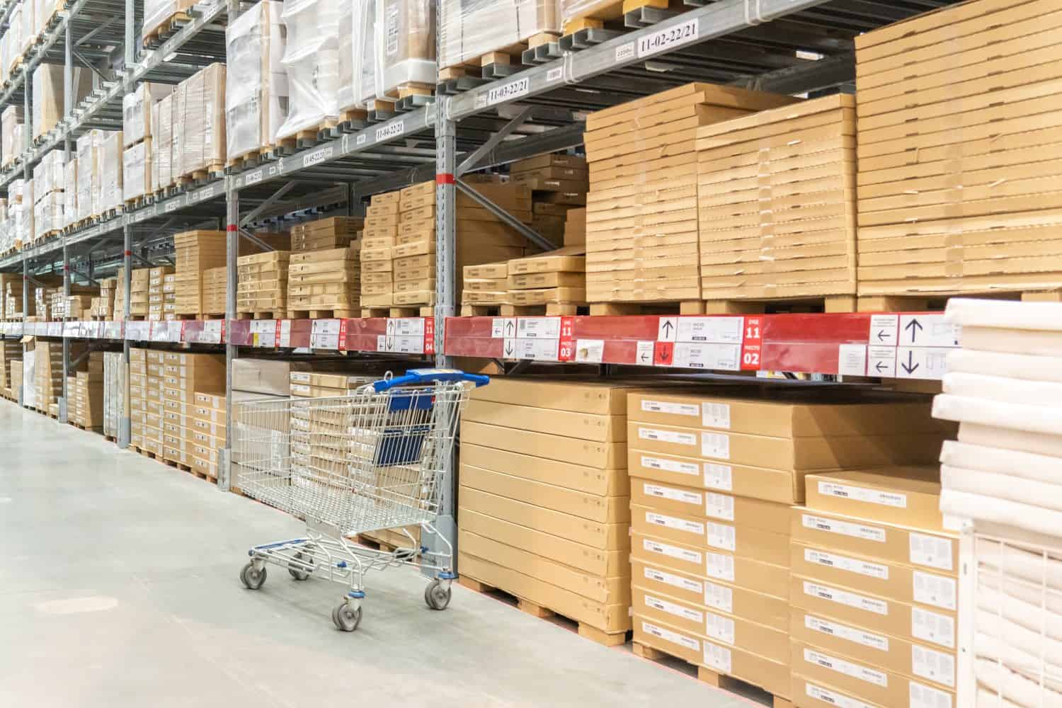 Rows of shelves with boxes in Ikea store in Moscow