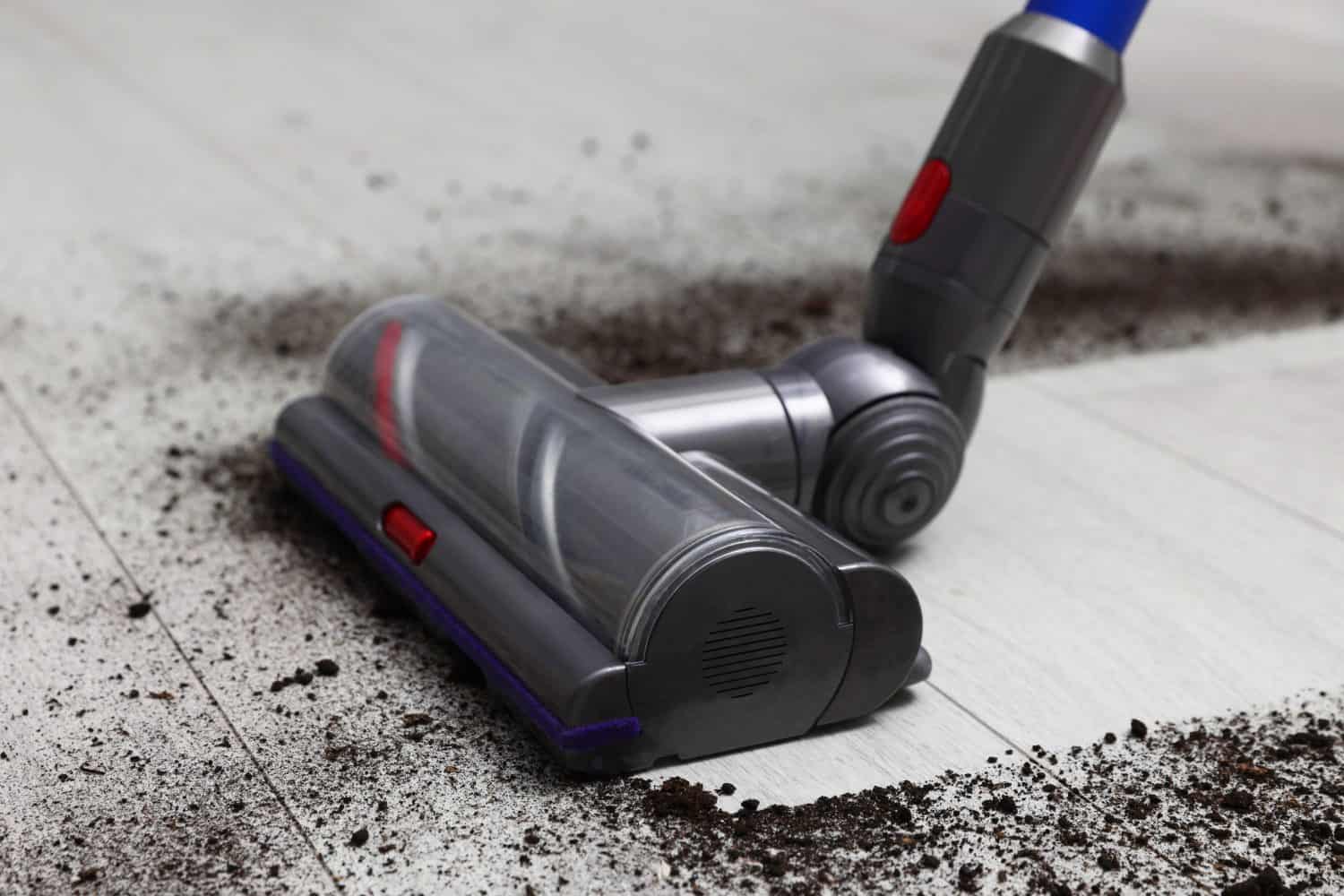 Cleaning floor with cordless vacuum cleaner indoors, closeup. I Loved My Dyson But These 8 Vacuum Brands Are a Better Deal