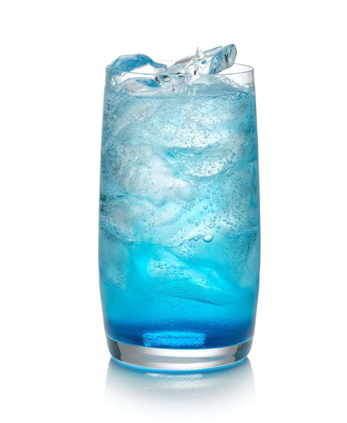 glass of blue cocktail isolated on white background Skip the Martini, These Classic Cocktails Are Better