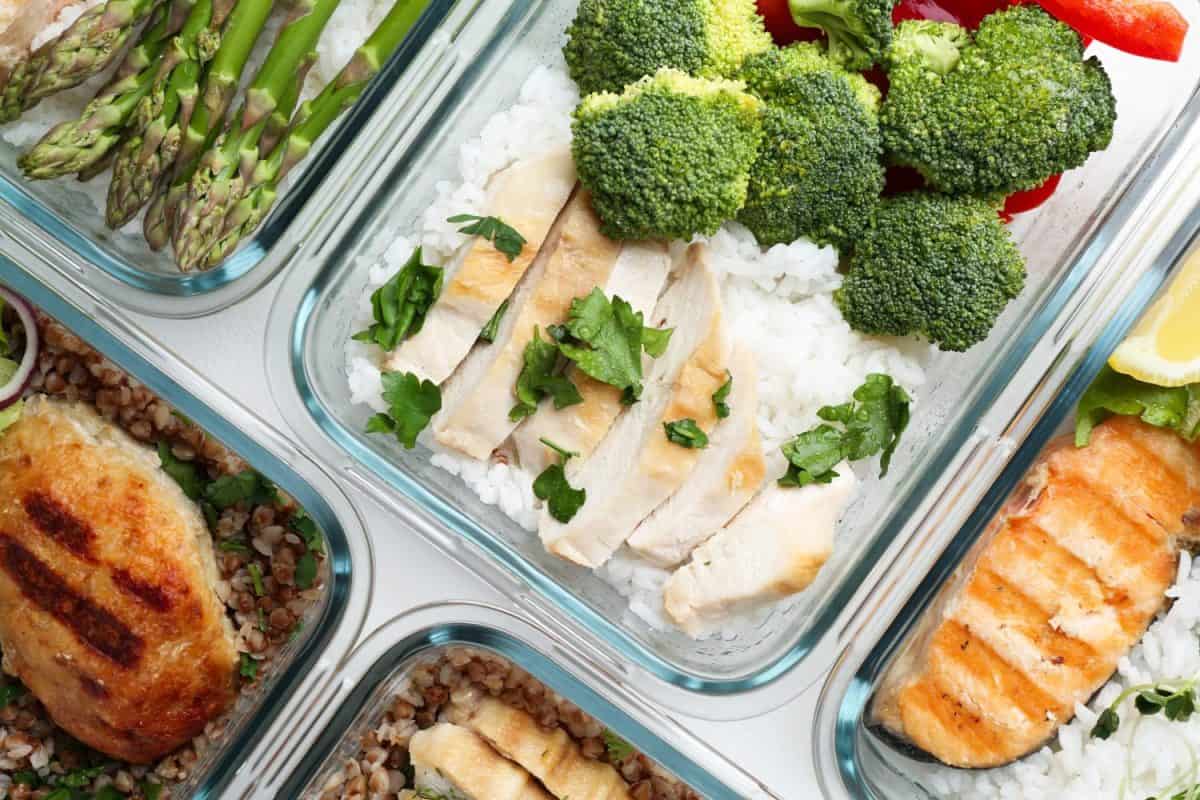 Healthy food. Different meals in glass containers on table, flat lay