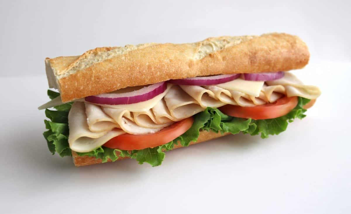 Turkey Baguette Sandwich with Lettuce, Tomato, Onion