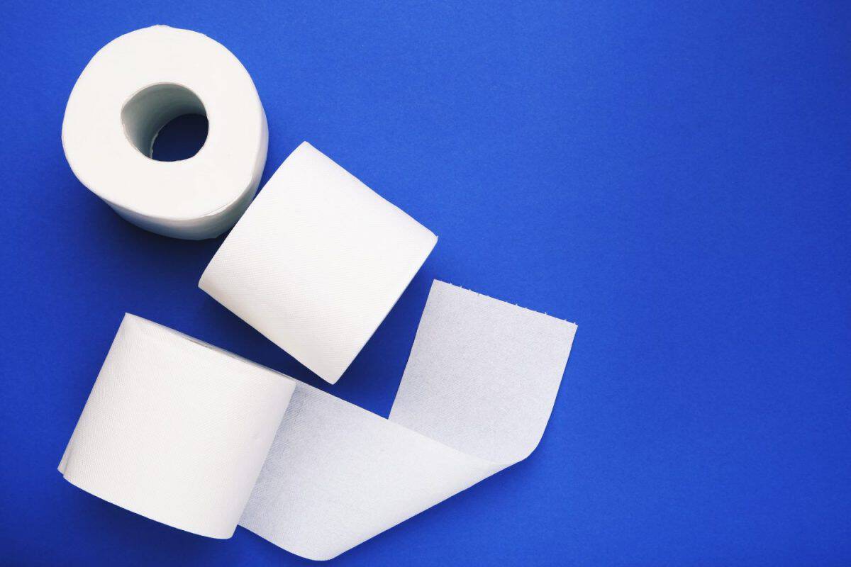 Soft rolls of toilet paper on blue background. Charmin Was My Family's Favorite for Years, But These 8 Toilet Paper Brands Are Better